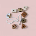 Wooden lacing toy